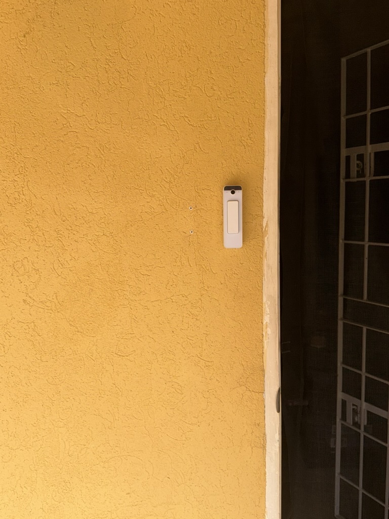 UniFi doorbell camera installed beside front door